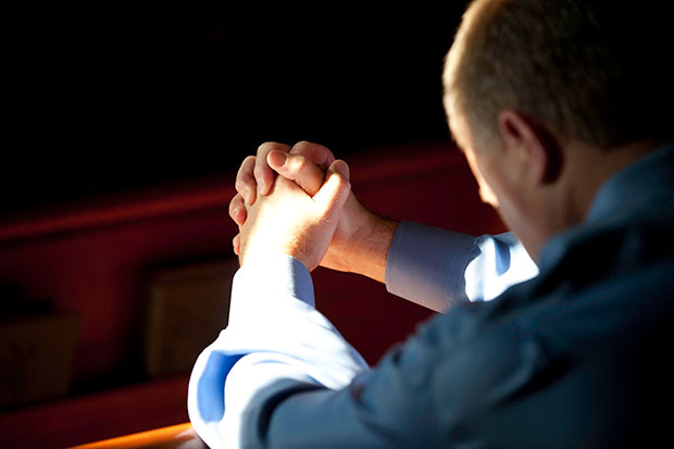 man praying